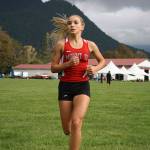 Mount Si runner Lyndsey Sydnor races at Mountain Meadows Farm in a 2013 home meet for the team.                                (File Photo)