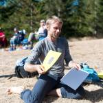 Using a pinhole projector a man reproduces the eclipse on a piece of paper for eclipse watchers at Snoqualmie Point Park.                                (Photo courtesy of Kristin Tetuan)