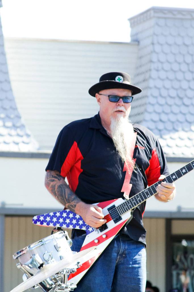 Snoqualmie insurance guy/rocker Jeff Warren plays during the Railroad Days parade.                                (Jessie Koon Photo)