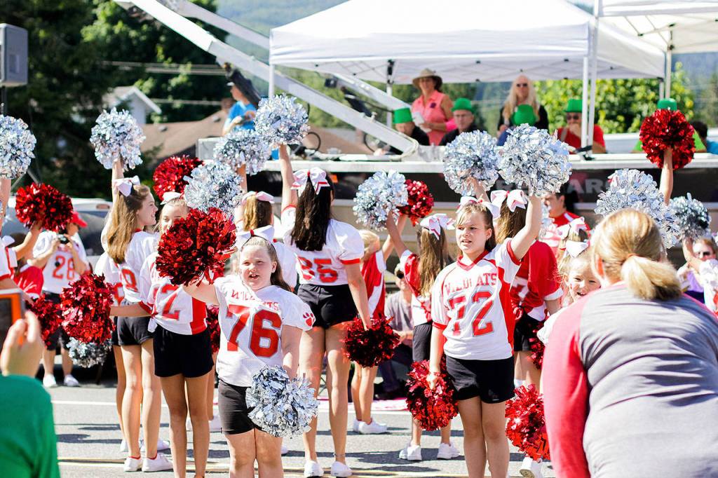 Junior cheerleaders perform for the parade judges Saturday.                                (Jessie Koon Photo)