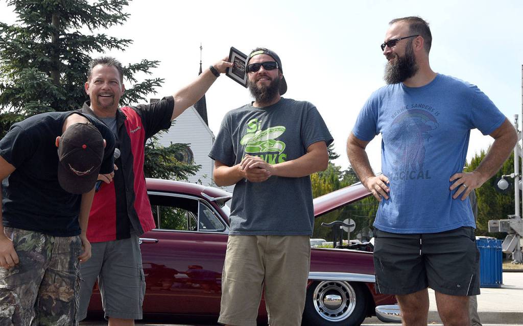 Strong competition turned out for the beard contest during Sunday&rsquo;s car show in Snoqualmie. Candidates included, from left, Cade, better known as &ldquo;peach fuzz,&rdquo; Isaiah Whalawhitsa, and the winner, John Delport.                                (Carol Ladwig/Staff Photo)