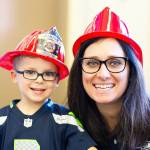 Raechel Frick and her son Henry donned firefighter helmets for Saturday&rsquo;s pancake breakfast.                                (Jessie Koon Photo)
