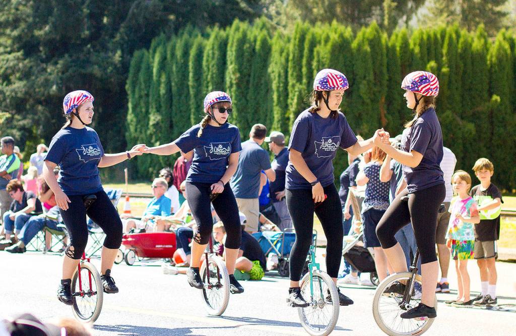 Snoqualmie Valley Unicycle Club members perform in the parade Saturday.                                (Jessie Koon Photo)