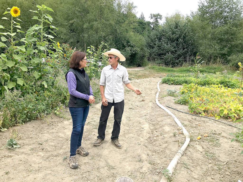 Congresswoman Suzan DelBene talks with Dancing Crow Farms&rsquo; Sean Stratman on a tour of the property last Thursday.                                (Courtesy Photo)
