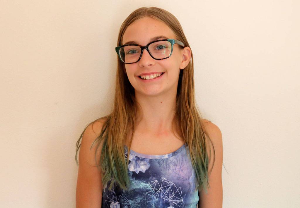 Audrey Newbrey-Smith is one of 12 youth ambassadors in the nation working to promote the continued fair treatment of thoroughbred horses. (Evan Pappas/Staff Photo)