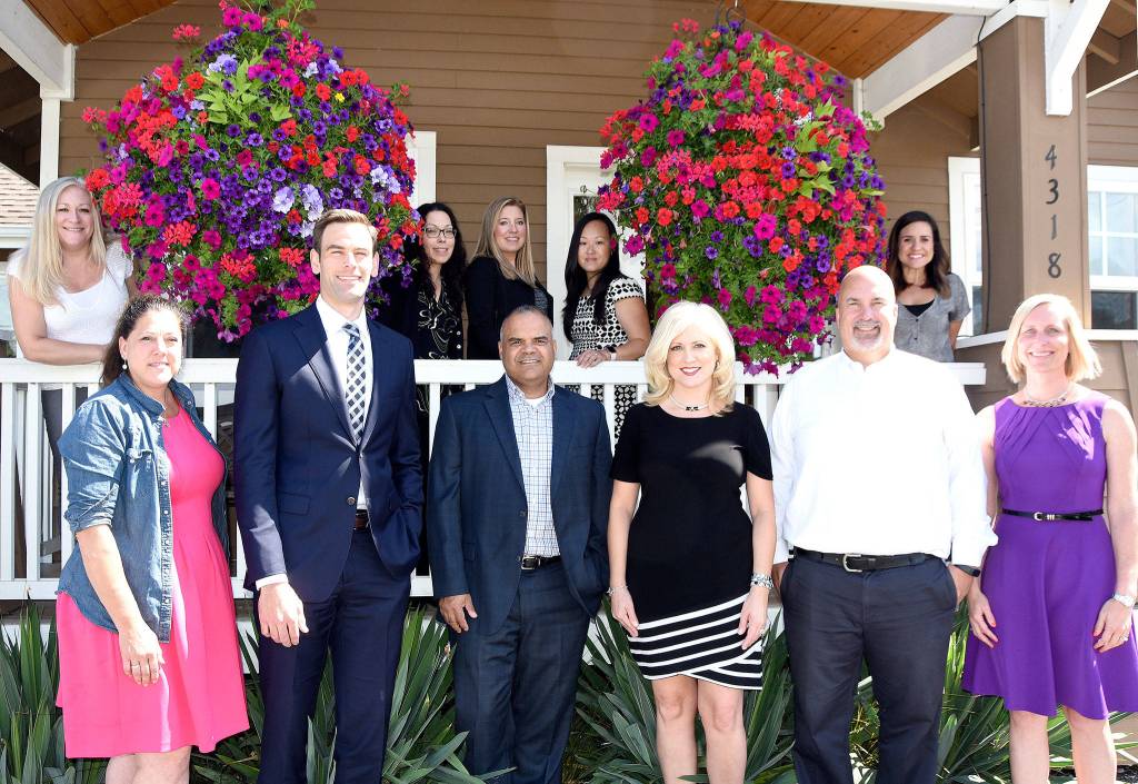 Brown and Sterling staff members, pictured from left are: front - Tina Laguna, Tim Wagar, Larry Brown, Ruth Rogers, Dave Rinn and Jaime Cole; back - Lynn Busser, Sarah Evans, Trishia Porter, Chanda Nowbilski and Jessica Pereira. (Carol Ladwig/Staff Photo)
