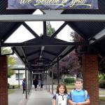Melanie and Michael Sligh pose for a photo outside Fall City Elementary School before they head inside to start first and second grades, respectively. (Carol Ladwig/Staff Photo)