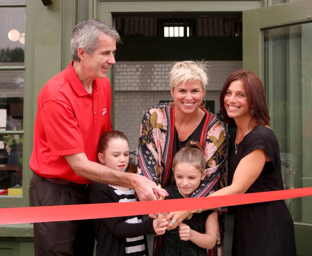 Evan Pappas/Staff Photo                                Heirloom Cookshop held its official ribbon cutting Sept. 5. From left, Snoqualmie Mayor Matt Larson, Ryanne Schumacher, Finely Schumacher, Kristen Schumacher, Snoqualmie Valley Chamber of Commerce Member Services Manager Monica Lynne.