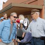 North Bend Mayor Ken Hearing adds some additional information to Battey&rsquo;s speech about the building that was once home to Boxley&rsquo;s and Brickyard Brewing. (Evan Pappas/Staff Photo)