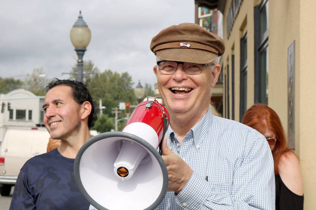Dave Battey laughs at some of the old stories being shared about the city. (Evan Pappas/Staff Photo)
