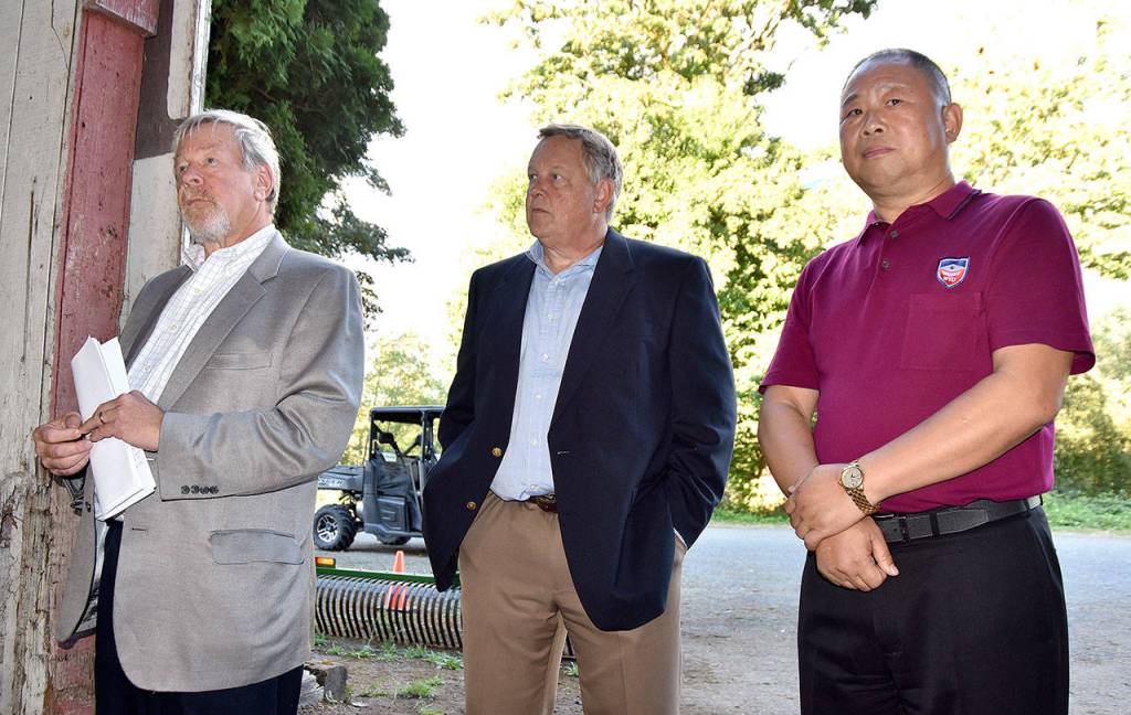 Washington Technology University staff at the meeting included from left: Steven Olswang, President; Bruce Bryant, Chief Financial Officer; and Chunlai Hou, who launched the private university.