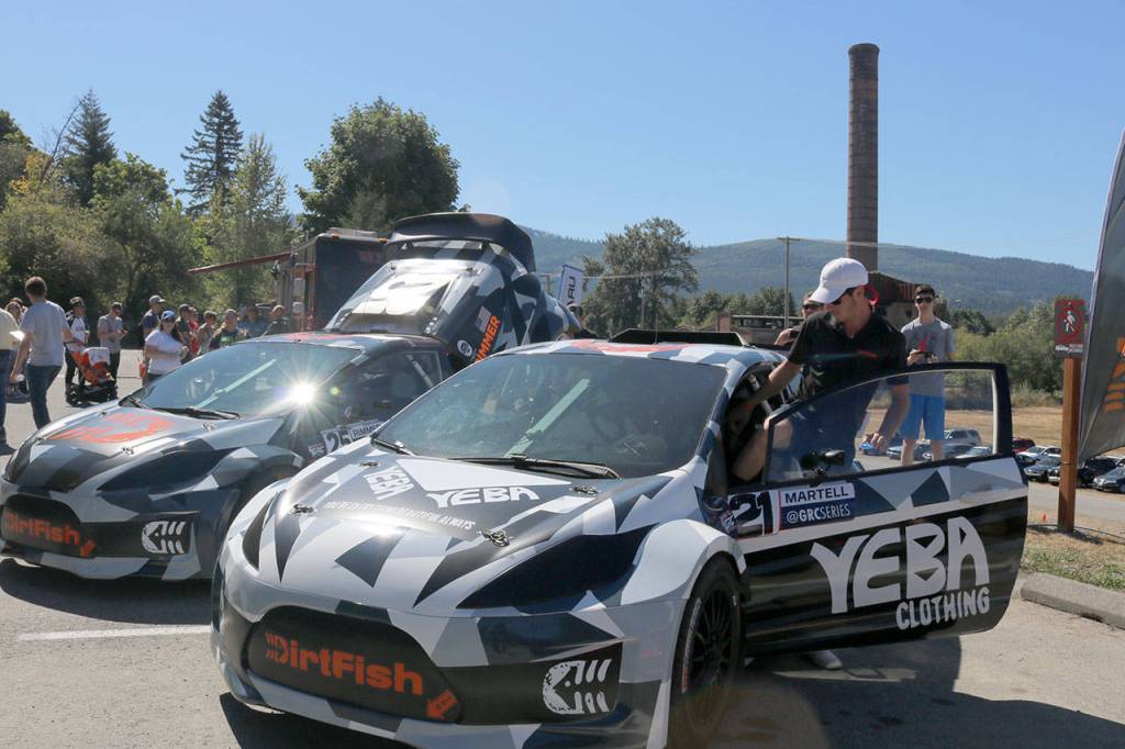 Connor Martell gets in his GRC car to drive it to another part of the car show.                                (Evan Pappas/Staff Photo)