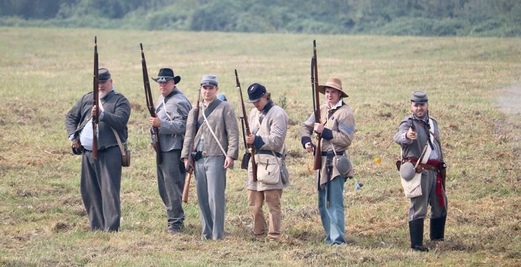 A group of Confederate soldiers line up to fire. (Evan Pappas/Staff Photo)