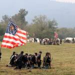 Union and Confederate soldiers begin firing shots at each other during the third annual Civil War re-enactment, The Battle of Snoqualmie, held on Saturday, Sept. 16, at Meadowbrook Farm. (Evan Pappas/Staff Photo)