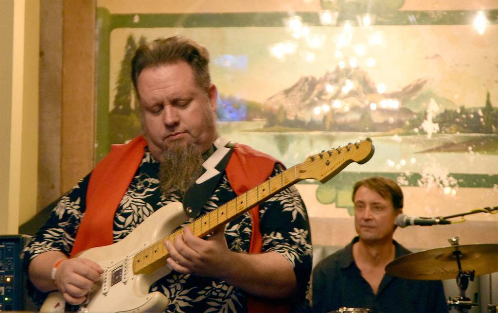 C.D.Woodbury solos during the 2016 Blues Walk. (Carol Ladwig/Staff Photo)