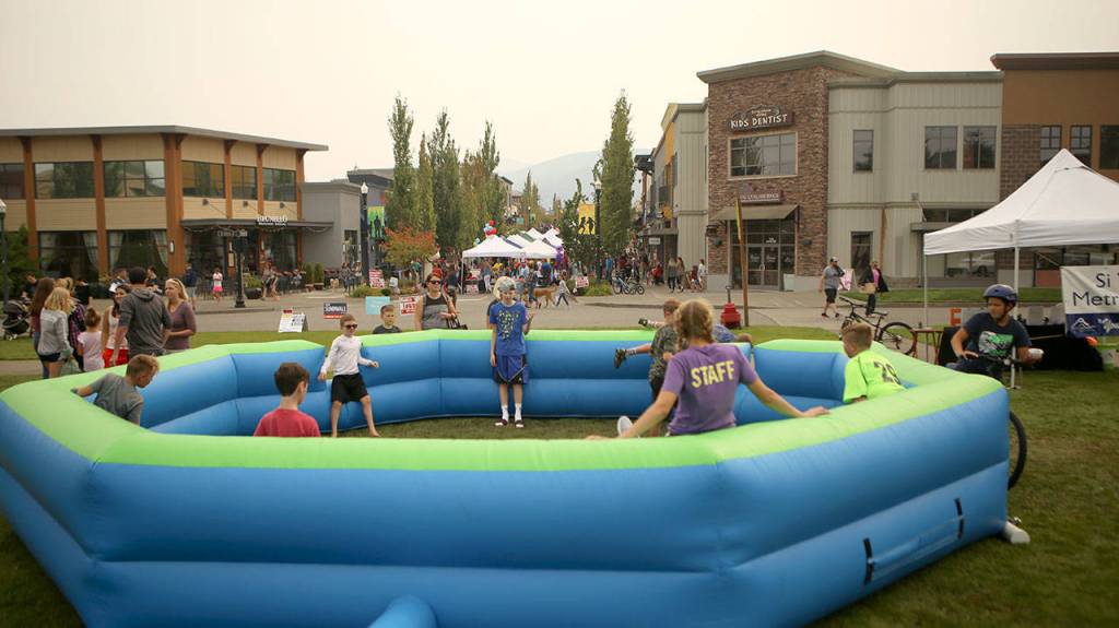 An inflatable arena for kids games was set up in Community Park. (Joe Dockery/Courtesy Photo)