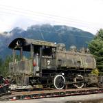 The No. 7 Porter arrives at the North Bend depot as volunteers prepare to get it off of the truck and on to the rails. (Evan Pappas/Staff Photo)