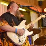 C.D. Woodbury sings his heart out at Twede&rsquo;s Cafe Saturday. (Carol Ladwig/Staff Photo)