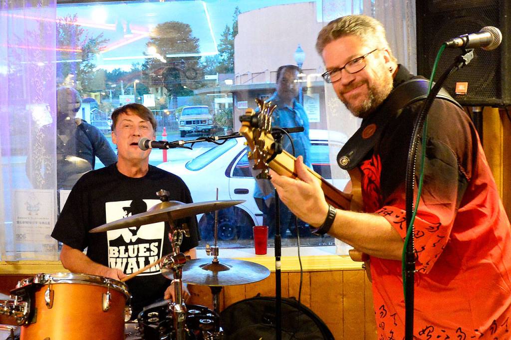 Don Montana on drums and Patrick McDanel, bass in the C.D. Woodbury Trio, mug for the camera. (Photo courtesy of Mary Miller)