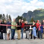 Everyone who had something to do with the latest round of improvements to Torguson Park &mdash; ball field updates, a new restroom and concessions building and a walking trail &mdash; joined in the cutting of the ribbon to celebrate Thursday, Sept. 14 at the park. (Carol Ladwig/Staff Photo)