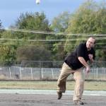 North Bend City Councilman Jonathan Rosen, an advocate of the Torguson Park improvements since they were first proposed, had the honor of throwing out the first pitch Thursday. (Carol Ladwig/Staff Photo)