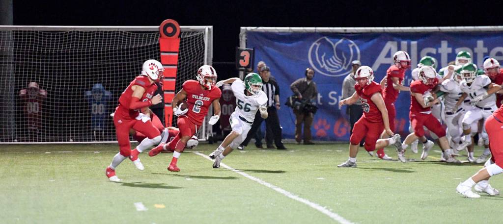 Jesiah Irish begins a big run in the second half of the game. (Photo courtesy of Calder Productions)