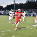 Quarterback Cale Millen pushes up the ball before Mount Si&rsquo;s first and only touchdown of the night. (Photo courtesy of Calder Productions)