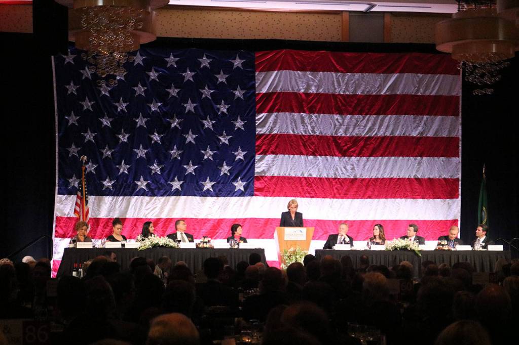 DeVos addresses the crowd at the Washington Policy Center&rsquo;s annual dinner at the Hyatt Regency on Friday. Nicole Jennings/staff photo