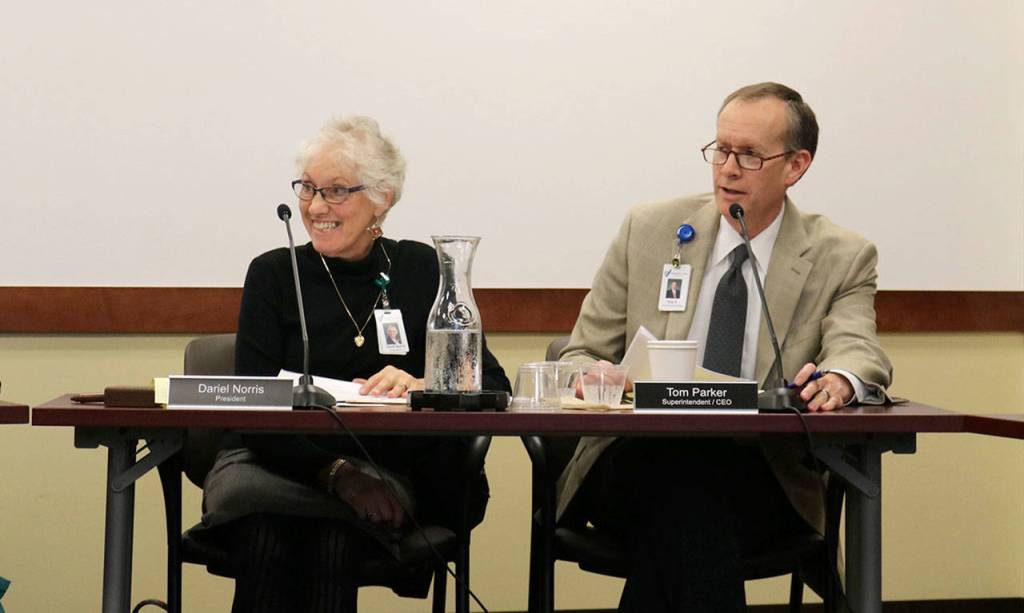 Board President Dariel Norris and Hospital CEO Tom Parker ask Gallagher questions about the history of Astria Health. (Evan Pappas/Staff Photo)