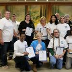 The 2017 Citizens Academy graduates were recognized at the Oct. 23 Snoqualmie City Council meeting. Pictured from left, are: standing - Mayor Matt Larson, James Mayhew, Tom Wood, James Rowland, Jennifer DeShong, Ann Logelin, Julie Gran, Richard Scheel Peggy Shepard, Karl Reinsch Luke Marusiak; and kneeling: Birol Shaha, Kate Schenkman, Iya Brown and Stephanie Rosolack. Graduates not in attendance were Jeff Hamlin, Lesley Shepard, Taylor Schulte, Kim Loop and Sallie Ewen. (Evan Pappas/Staff Photo)