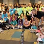 Girl Scouts gathered around to watch James McLurkin demo some of the robots. (Courtesy Photo)