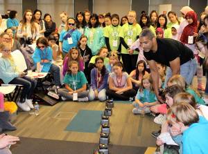 Girl Scouts gathered around to watch James McLurkin demo some of the robots. (Courtesy Photo)
