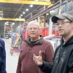 Daryl Petree explains his job to a student group taking a tour through the warehouse. (Evan Pappas/Staff Photo)