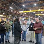Tim Anderson leads a tour through the Technical Glass Products warehouse. (Evan Pappas/Staff Photo)