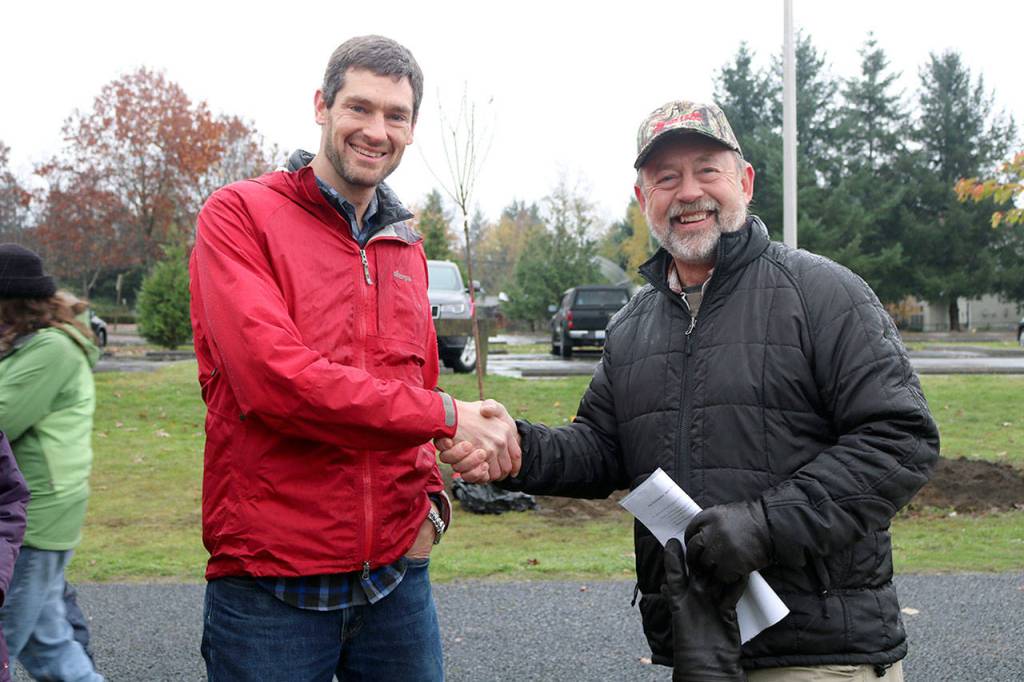 North Bend Senior Planner Mike McCarty and Mayor Ken Hearing spoke to all the volunteers before the tree planting begins. (Evan Pappas/Staff Photo)