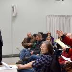 Jean Buckner, North Bend resident, suggests alternatives to siting a Washington State Patrol weigh station just outside North Bend. (Carol Ladwig/Staff Photo)