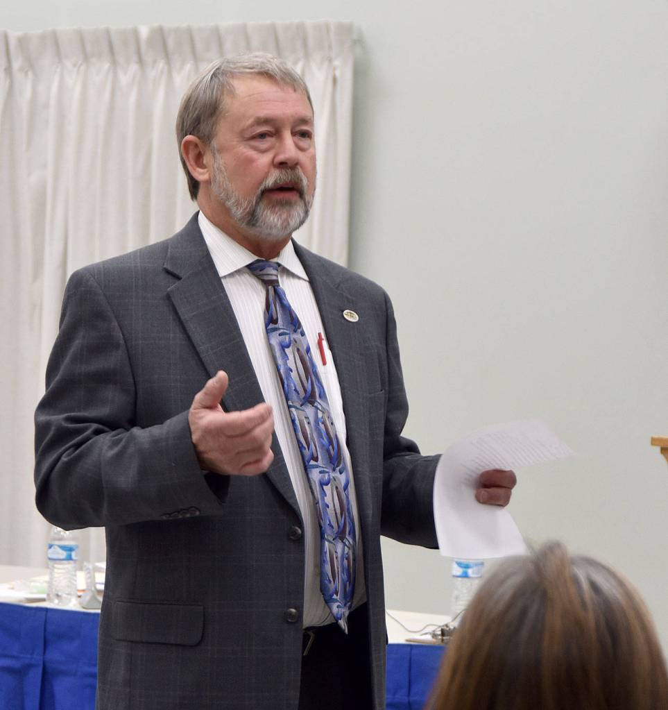 Mayor Ken Hearing started the town hall meeting with a brief history of trucks in North Bend. (Carol Ladwig/Staff Photo)