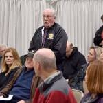 A North Bend truck driver told residents that his truck had an excellent safety record, and added that many of the prior speakers had impugned truck drivers integrity. He suggested alternatives to the weigh station, including in some freeway medians, and encouraged all parties to back off the trigger and work to solve this. (Carol Ladwig/Staff Photo)