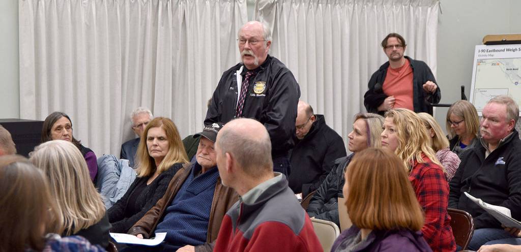 A North Bend truck driver told residents that his truck had an excellent safety record, and added that many of the prior speakers had impugned truck drivers integrity. He suggested alternatives to the weigh station, including in some freeway medians, and encouraged all parties to back off the trigger and work to solve this. (Carol Ladwig/Staff Photo)