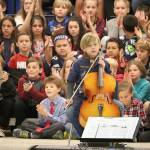 Noah Gallardo played a solo cello piece at the end of the Opstad assembly.                                Evan Pappas/Staff Photo
