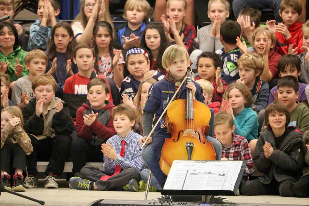 Noah Gallardo played a solo cello piece at the end of the Opstad assembly.                                Evan Pappas/Staff Photo