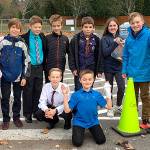 Snoqualmie Elementary Schools VIP parking committee gathered on Nov. 9 to mark designated parking spaces for their guests. (Courtesy Photo)