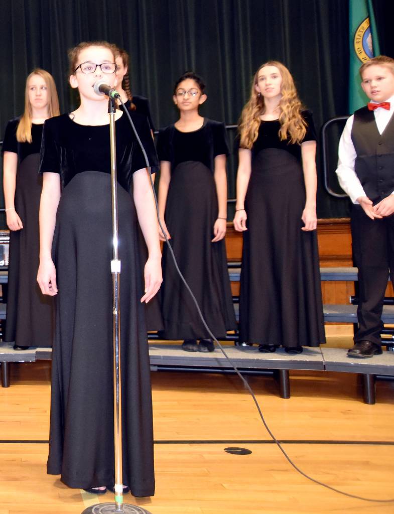 A Chief Kanim Middle School student solos in a past holiday concert. (Carol Ladwig/File Photo)
