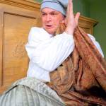 Scrooge is woken up from a deep sleep by a ghost. (Courtesy Photo)