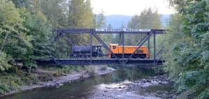 A steam locomotive donated from the city of Bellingham in September, 2017, makes its way over the Snoqualmie River on bridge 35 to its new home at the Northwest Railway Museum. (Photo courtesy of Northwest Railway Museum)