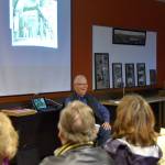 Historian Dave Battey laughs at stories shared during a celebration of the Snoqualmie Falls Lumber Company/Weyerhaeuser centennial. (Carol Ladwig/Staff Photo)