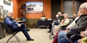 Dave Battey led a presentation Saturday on the history of the Snoqualmie Falls Lumber Company, which started at Snoqualmie Falls 100 years ago. (Carol Ladwig/Staff Photo)