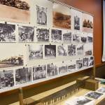 A display of historic photos drew many guests during the intermission. (Carol Ladwig/Staff Photo)