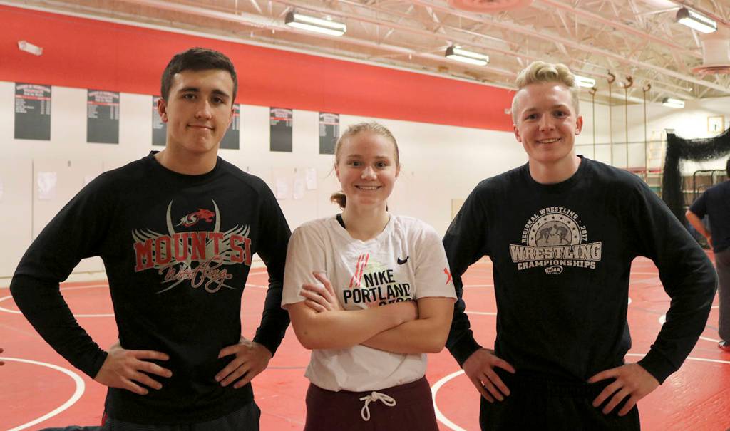 Evan Pappas/Staff Photos                                Mount Si High School wrestling team captains, are, from left, seniors Connor Holt, Kinsey Steskal, and Duncan Harrison.