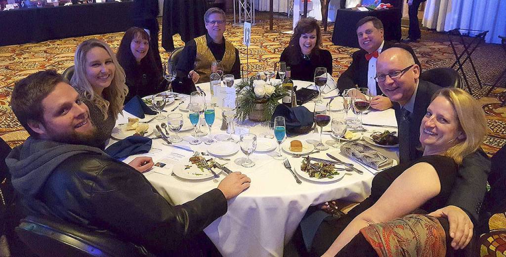 Gala guests smile for a group photo at the Nov. 17 Winter Wonderland gala, put on by the Snoqualmie Valley Chamber of Commerce. (Courtesy Photo)